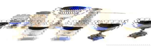 A Group of Three Georgian Silver Salts, Length of: A Group of Three Georgian Silver Salts, each having cobalt glass liners, together with four silverplate salts, a silverplate coaster, a burner, 13 silver and silverplate salt spoons, a fork and others