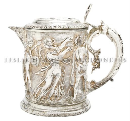 A Silverplate Tankard, Height 7 1/2 inches.: A Silverplate Tankard, having a continous band of figures around the handled body. Height 7 1/2 inches. Property from the Collection of Mr. John Mix, Chicago, Illinois