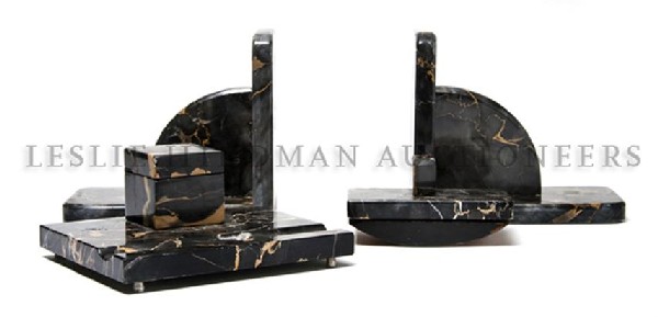An Art Deco Style Four Piece Marble Desk Set, Hei: An Art Deco Style Four Piece Marble Desk Set, comprising a pair of bookends, an inkwell and a blotter. Height of first 6 5/8 x length 7 1/2 x width 3 3/4 inches.