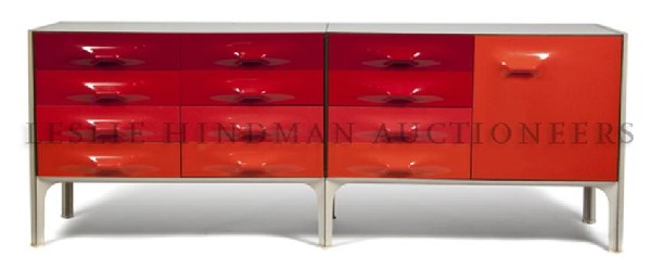 A French Raymond Loewy Sideboard, Doubinsky Frere: A French Raymond Loewy Sideboard, Doubinsky Freres, model number DF2000, the wood and laminate cabinet having red and orange molded plastic drawer and door fronts, having three columns of four aligned
