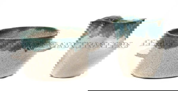 A Group of Two Ceramic Articles, Eugene Deutch, H: A Group of Two Ceramic Articles, Eugene Deutch, comprising a circular handled bowl having cream glaze and turquoise rim and two ear form handles, the pitcher having a pinched handle with cream glaze a
