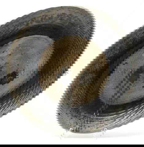 A Stoneware Platter, Don Reitz (b. 1929), Diamete: A Stoneware Platter, Don Reitz (b. 1929), the salt glazed platter with concentric throwing rings, having a cream and navy glaze to surface with splashed green glaze through center, inscribed Reitz on