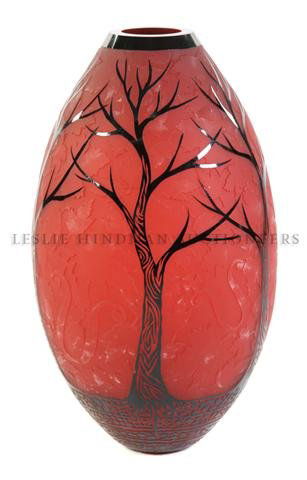 A Glass Vase, Duncan McClellan,: Fall, acid etched decoration of maple leaves and enameled silhouettes of trees on a naturalistic ground, signed.