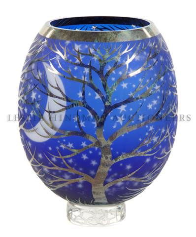A Glass Vase, Duncan McClellan,: Winter Night, having acid etched and enameled trees with a metallic appearance, the interior on a blue ground with moon and star decoration, signed.