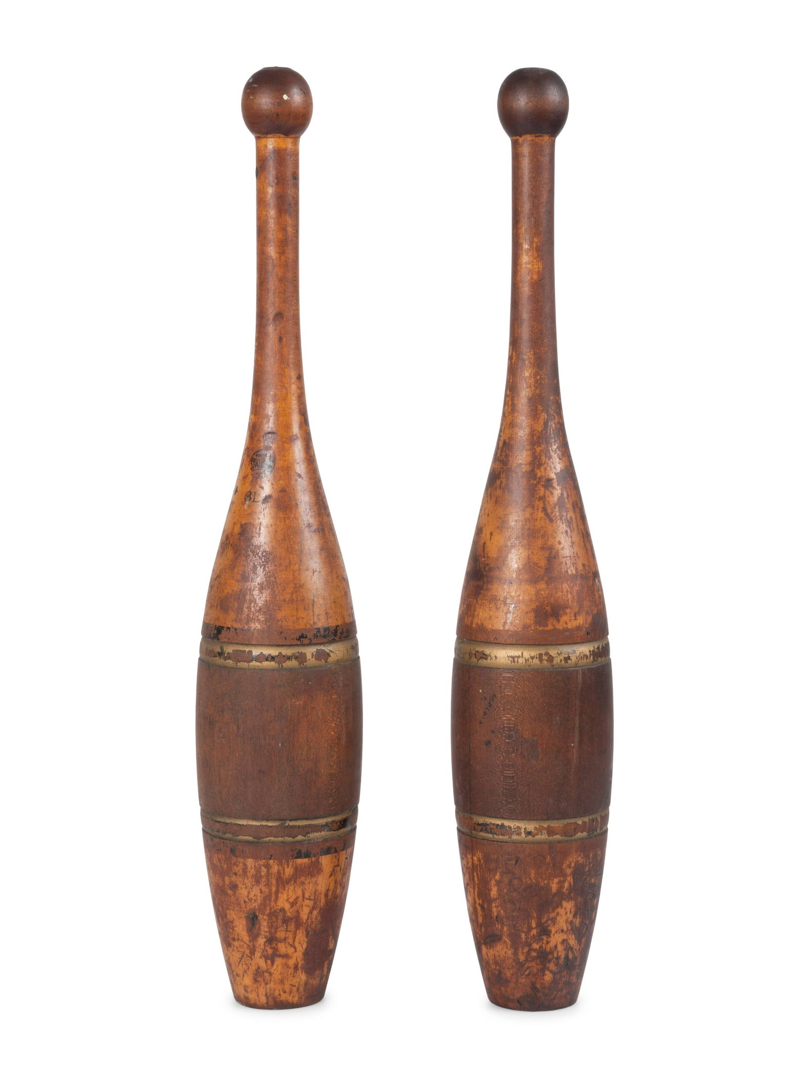 A Pair of Spalding 3Lb. Turned and Parcel Gilt: A Pair of Spalding 3Lb. Turned and Parcel Gilt Cherrywood Juggler's Pins Height 20 inches. Property from the Collection of Dr. James Dawson, Manchester, Kentucky