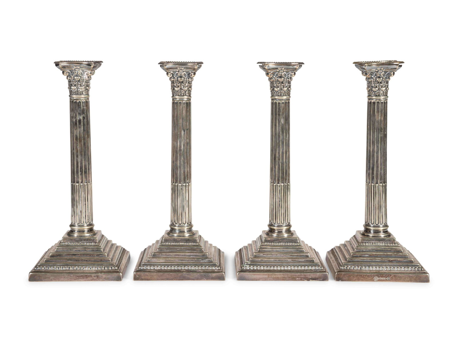 A Set of Four English Silver-Plate Candlesticks (1 of 2)
