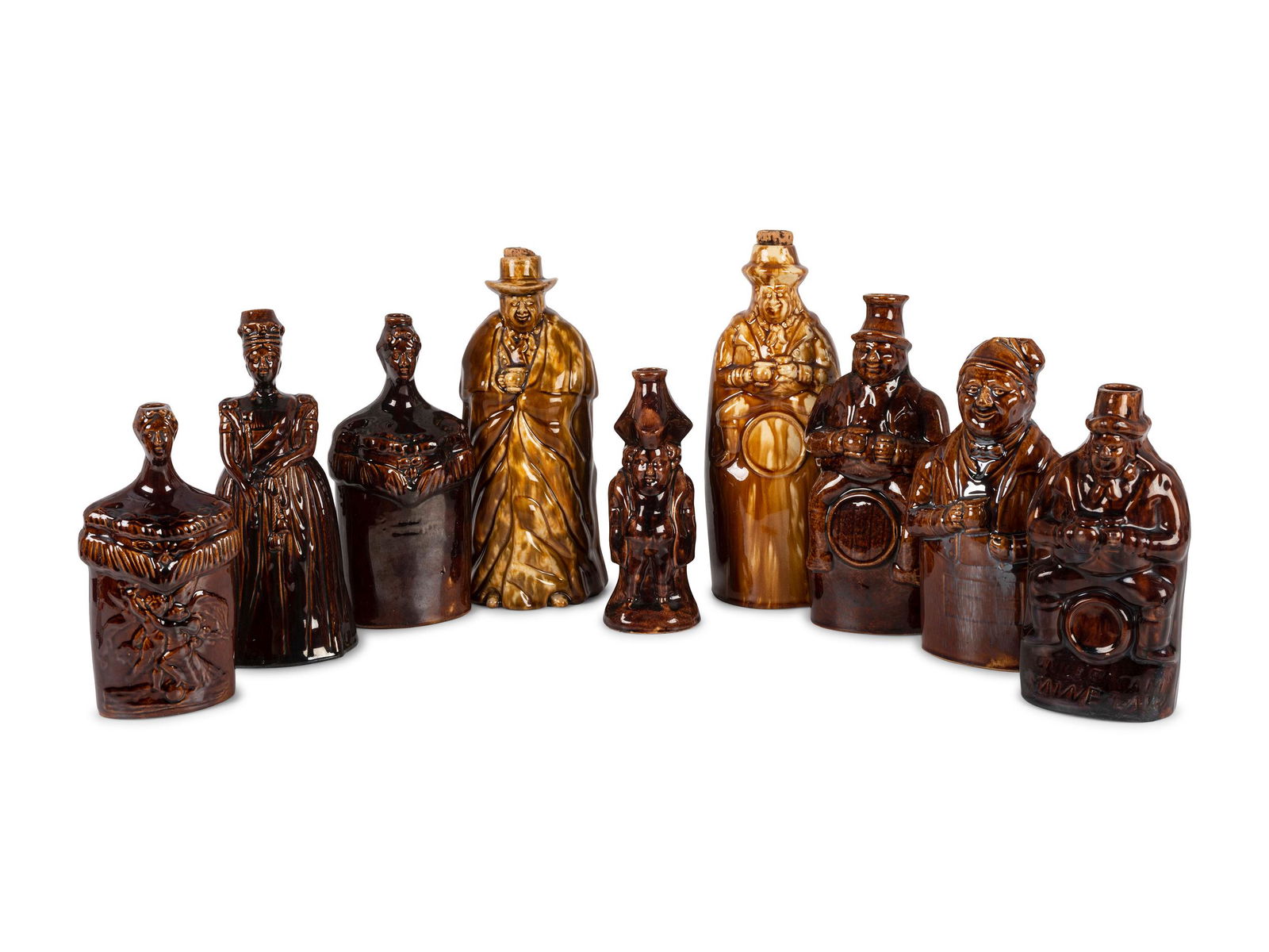 Nine Figural Flasks in Brown Glaze (1 of 4)