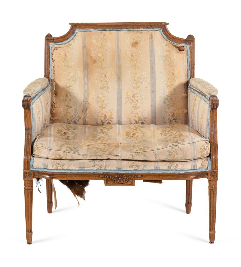 A Louis XVI Beechwood Marquise: A Louis XVI Beechwood Marquise 18th Century Height 37 x width 34 inches.