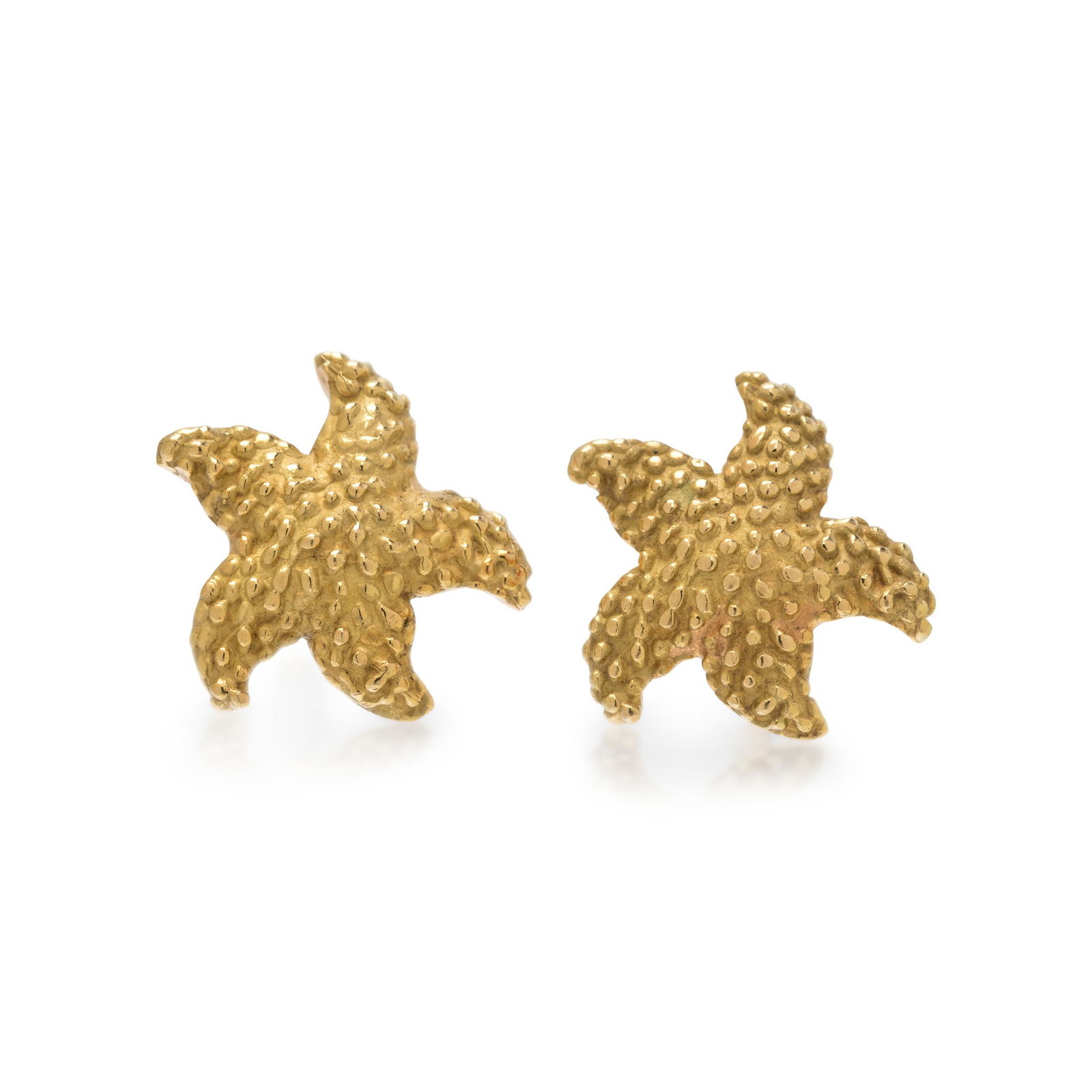 MCTEIGUE, TIFFANY & CO., YELLOW GOLD STARFISH EARRINGS: MCTEIGUE, TIFFANY & CO., YELLOW GOLD STARFISH EARRINGS Consisting of two textured starfish. 1/2 inch wide. Stamp: TIFFANY(obscured) (McTeigue maker's mark) 18K. 2.50 dwt.