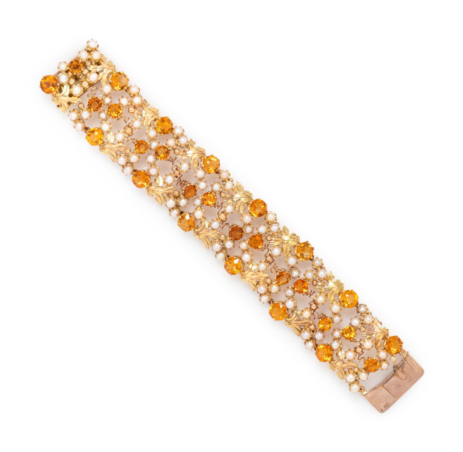 YELLOW GOLD, CITRINE AND CULTURED PEARL BRACELET: YELLOW GOLD, CITRINE AND CULTURED PEARL BRACELET Containing numerous round mixed cut citrines measuring approximately 5.90-7.30 mm in diameter and numerous pearls. 7 inches long. Stamp: 9CT. 30.35 dwt