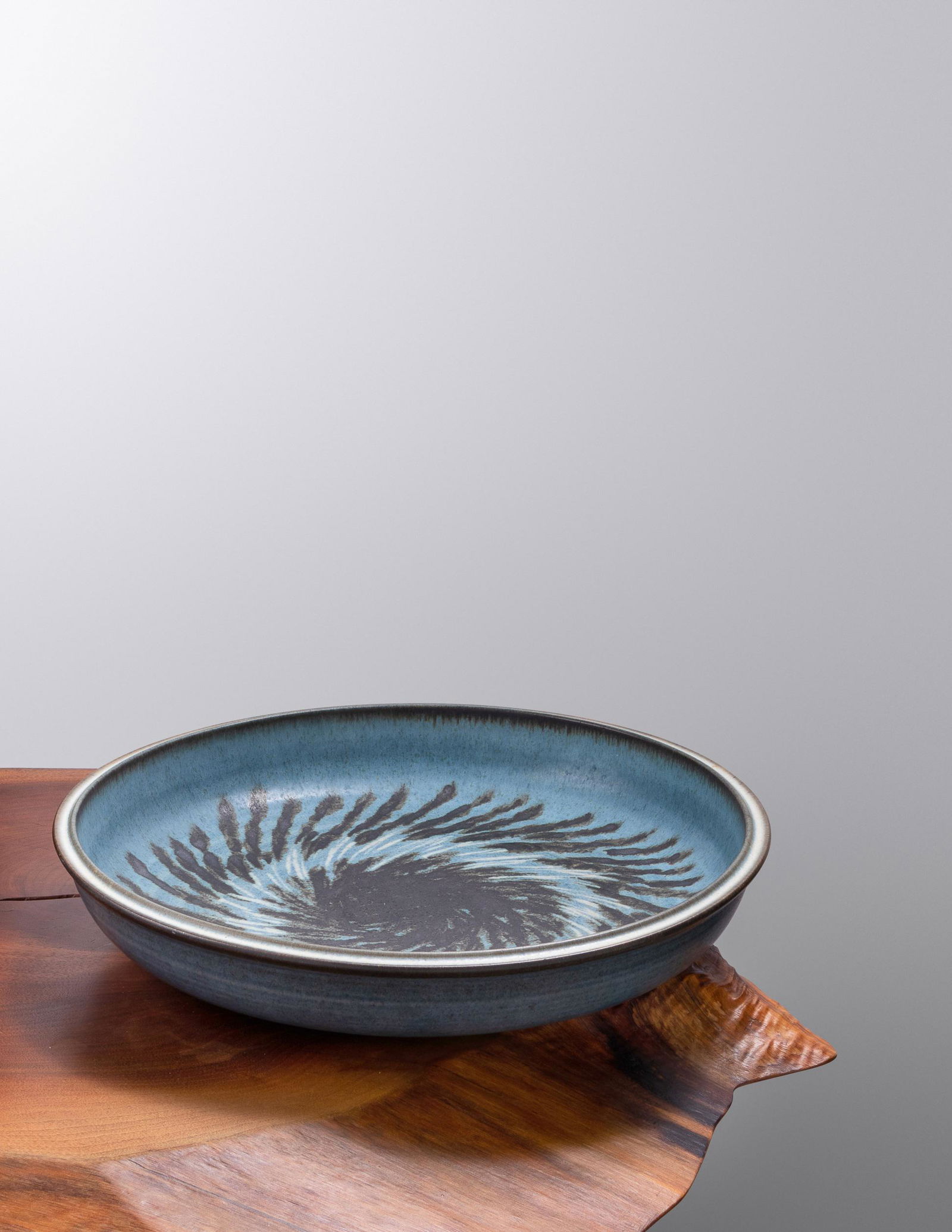 Harrison McIntosh (American, 1914-2016) Charger: Harrison McIntosh (American, 1914-2016) Charger glazed stoneware impressed chop mark 'HM' and original paper label to underside H 2 1/2 x Dia 15 inches Property from the Estate of Professor Ethan D. A