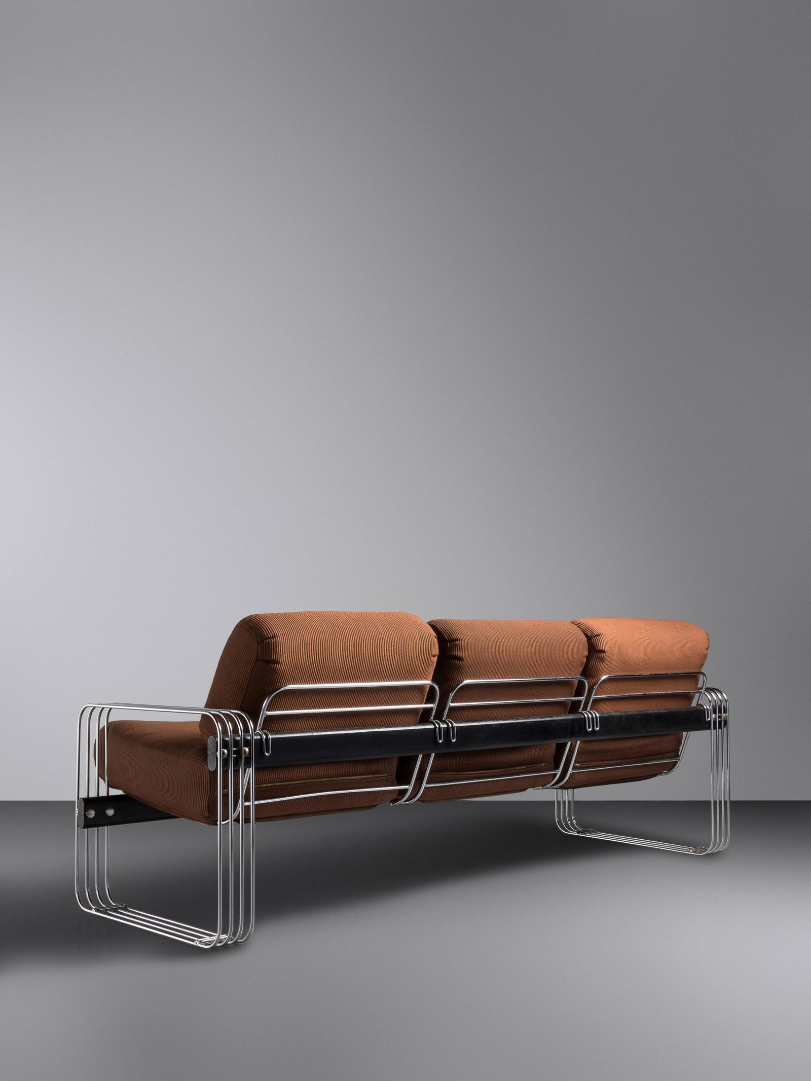 Trix and Robert Haussmann (Swiss, b. 1933 | Swiss, b.: Trix and Robert Haussmann (Swiss, b. 1933 | Swiss, b. 1931) Sofa, c. 1970 De Sede, USA/Switzerland upholstery, wood, chrome-plated steel H 32 x W 83 1/2 x D 32 inches Property from the Estate of Ryna