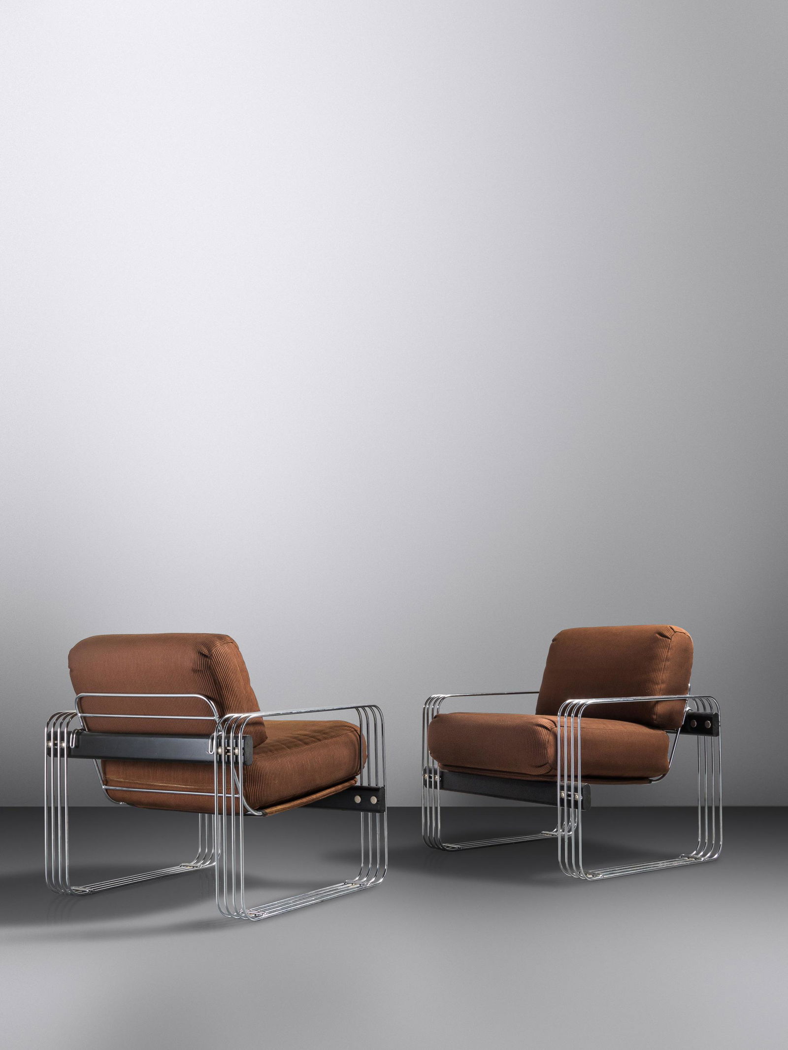Trix and Robert Haussmann (Swiss, b. 1933 | Swiss, b.: Trix and Robert Haussmann (Swiss, b. 1933 | Swiss, b. 1931) Pair of Lounge Chairs, c. 1970 De Sede, USA/Switzerland upholstery, wood, chrome-plated steel H 32 x W 33 x D 30 inches Property from the Es