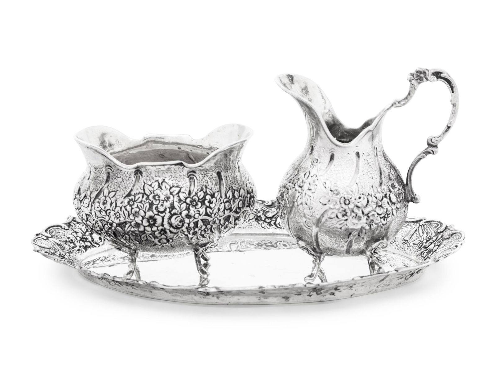 A German Silver Three-Piece Cream and Sugar Set (1 of 4)
