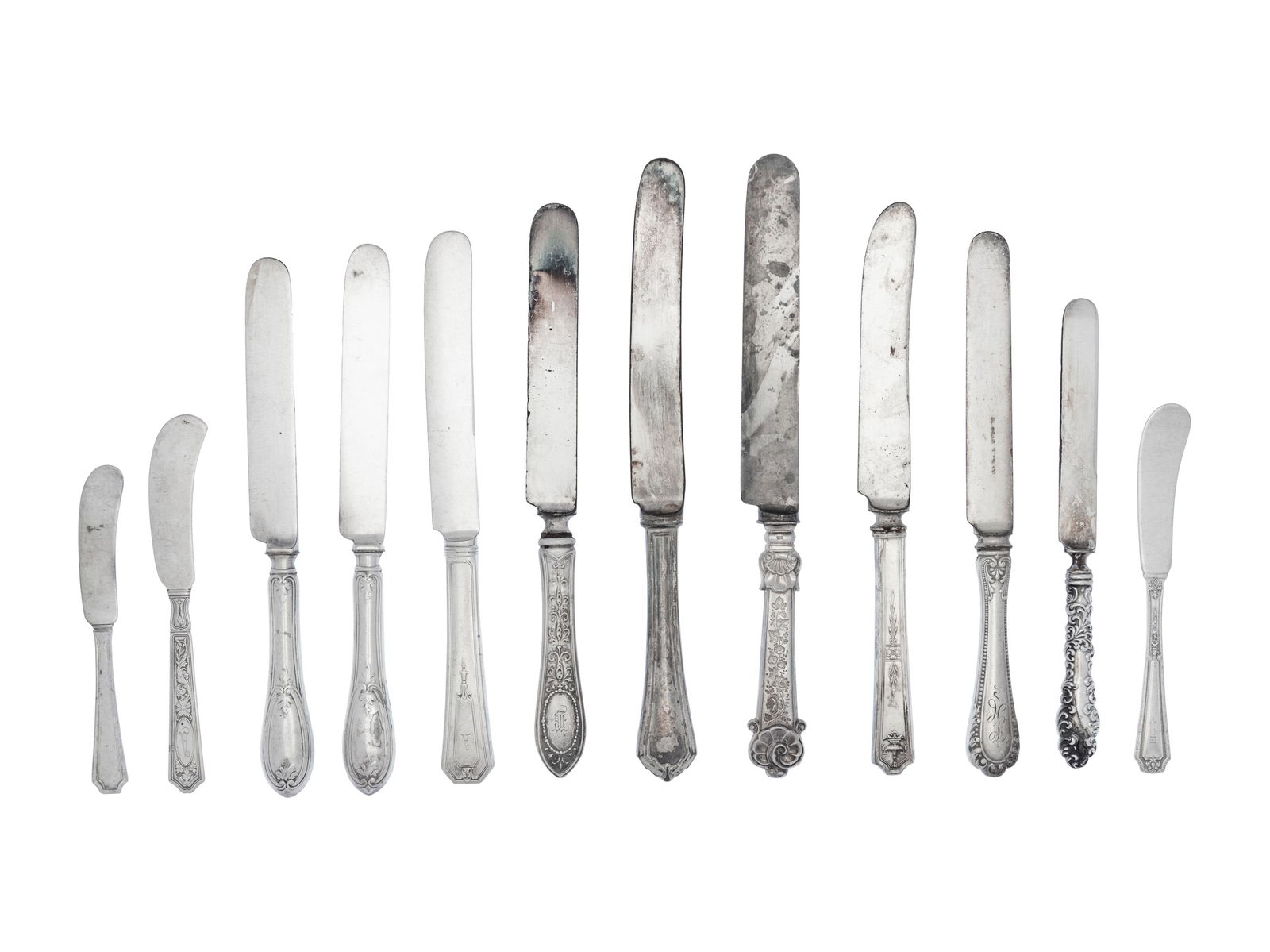 A Collection of Silver and Silver-Plate Knives (1 of 3)