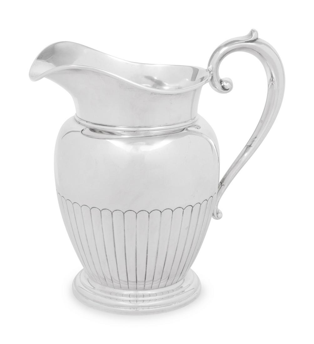 An American Silver Water Pitcher: An American Silver Water Pitcher Manchester Silver Co., Providence, RI marked 'Sterling' to underside 24 ozt Height 9 1/2 inches. Property from the Collection of Mr. James Lee Soffer, Pittsburgh, Penn
