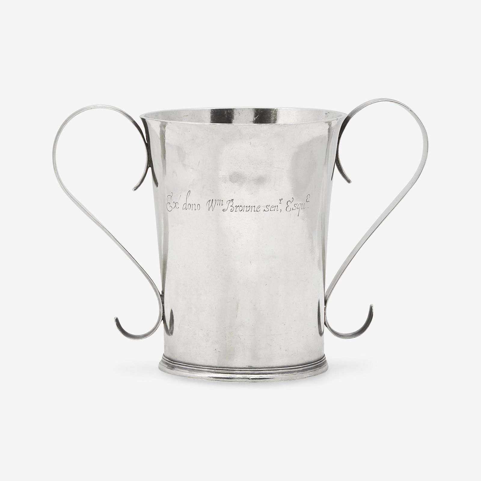 A rare silver beaker John Coney (1655-1722), Boston,: A rare silver beaker John Coney (1655-1722), Boston, MA, circa 1687 The body engraved with inscription, "Ex dono Wm Browne senr, Esque.," with somewhat later strap handles, marked to body and undersid