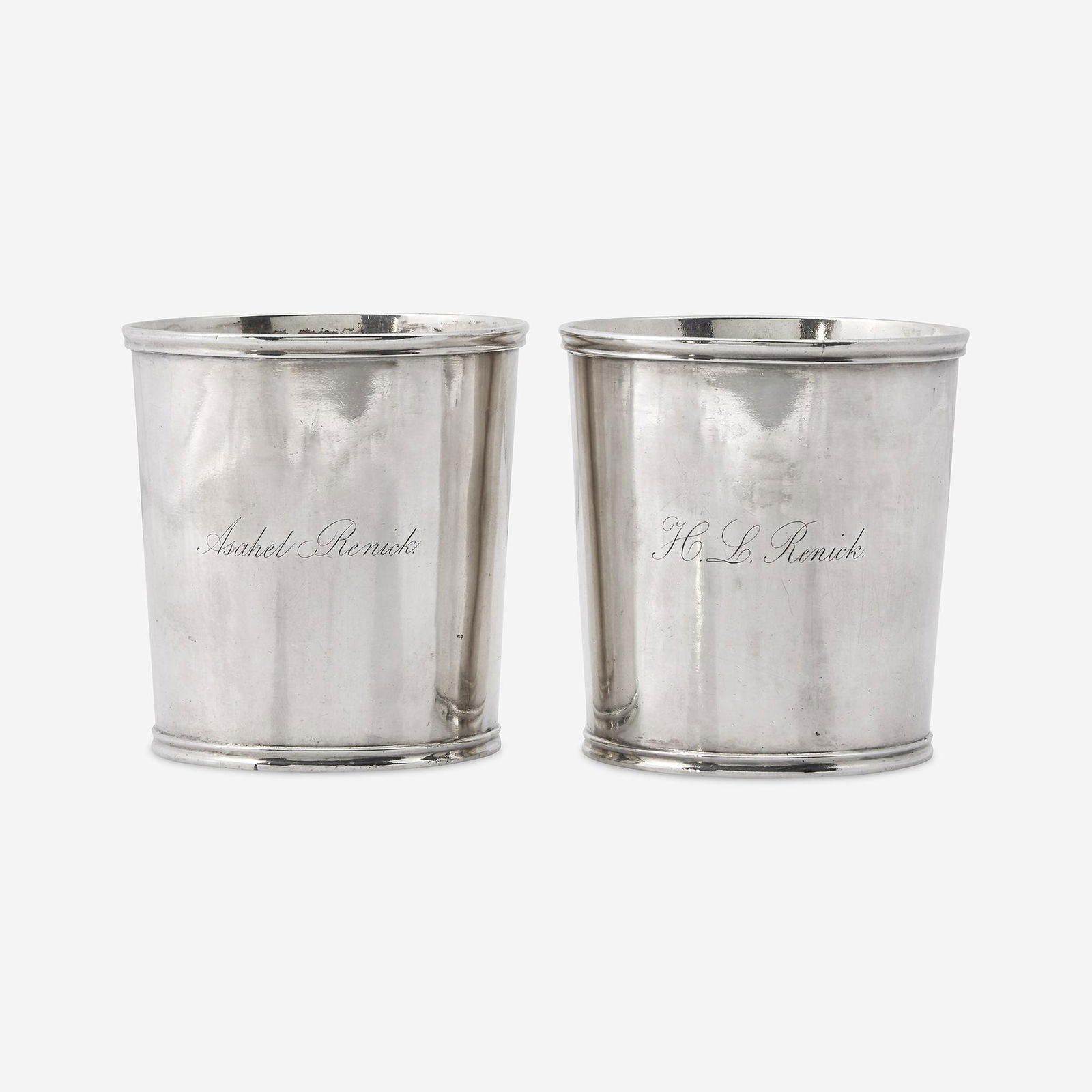 A pair of silver beakers Robert Wilson and William: A pair of silver beakers Robert Wilson and William Wilson (active circa 1825-1846), Philadelphia, PA, circa 1840 Tapered bodies with molded upper and lower rims, one beaker engraved, "Asahel Renick,"