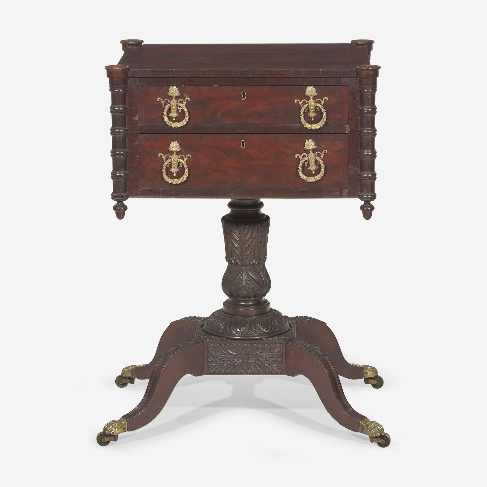 A Classical carved mahogany and rosewood work table (1 of 2)