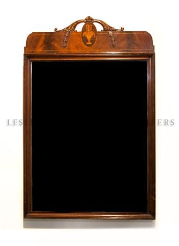 A Federal Style Mahogany Mirror, Height 37 1/2 x width : A Federal Style Mahogany Mirror, the rectangular plate beneath the carved crest having inlaid urn decoration. Height 37 1/2 x width 24 inches. Property from the Collection of Jeff Foster, Chicago, IL