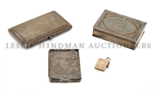 A Group of Three Silver Compacts, Length of longest 3 1: A Group of Three Silver Compacts, each of rectangular form, having various decoration, together with a locket in the form of a compact. Length of longest 3 1/4 inches.