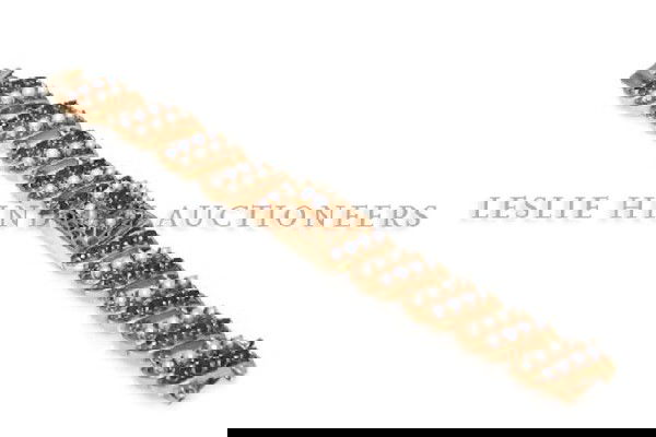 A 14 Karat Yellow Gold, Cultured Pearl and Sapphire Mec: A 14 Karat Yellow Gold, Cultured Pearl and Sapphire Mechanical Wristwatch, Wittnauer, containing 42 round sapphires weighing approximately 3.25 carats and 42 cultured pearls measuring approximately 2.