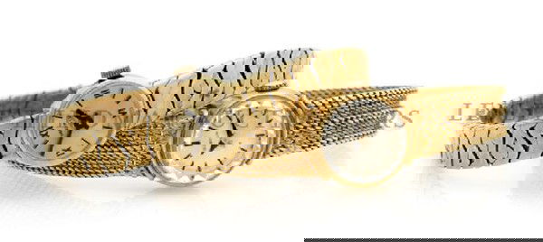 A Group of Yellow Gold Wristwatches, 37.90 dwts.: A Group of Yellow Gold Wristwatches, consisting of an 18 karat Gubelin mechanical wristwatch with a gold mesh bracelet and a 14 karat Spaulding mechanical wristwatch with a woven motif bracelet. 37.90