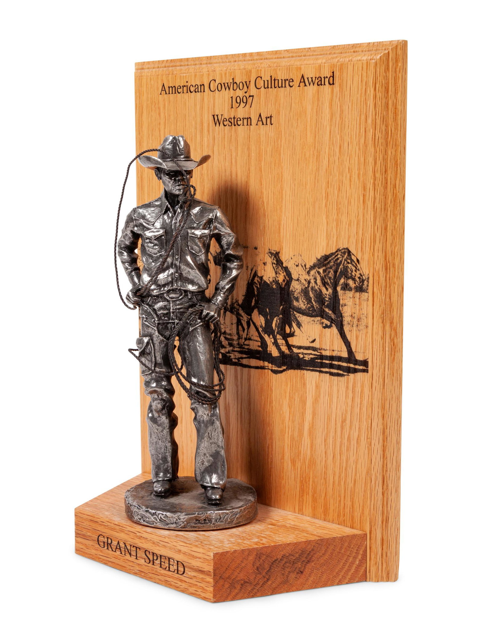 American Cowboy Culture Award, Western Art, Awarded to: American Cowboy Culture Award, Western Art, Awarded to Grant Speed in 1997 pewter signed Bob (base) height 10 1/4 x width 4 x depth 4 inches Property from the Estate of Richard Altermann, Santa Fe, Ne