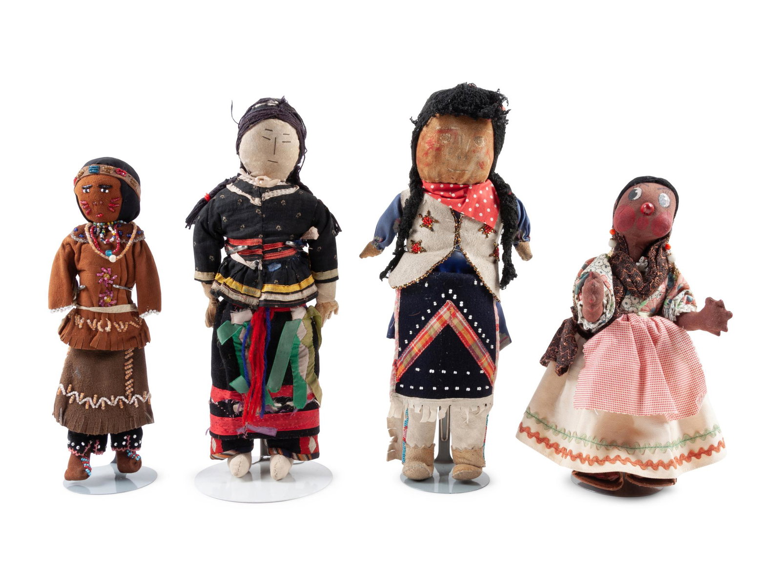 Tuscarora, Woodlands, Chippewa Cree, and Osage Dolls: Tuscarora, Woodlands, Chippewa Cree, and Osage Dolls mid-20th century lot of 4, includes: tallest 12 1/2 inches The Marilyn Eber Collection of Native American Art, Denver, Colorado