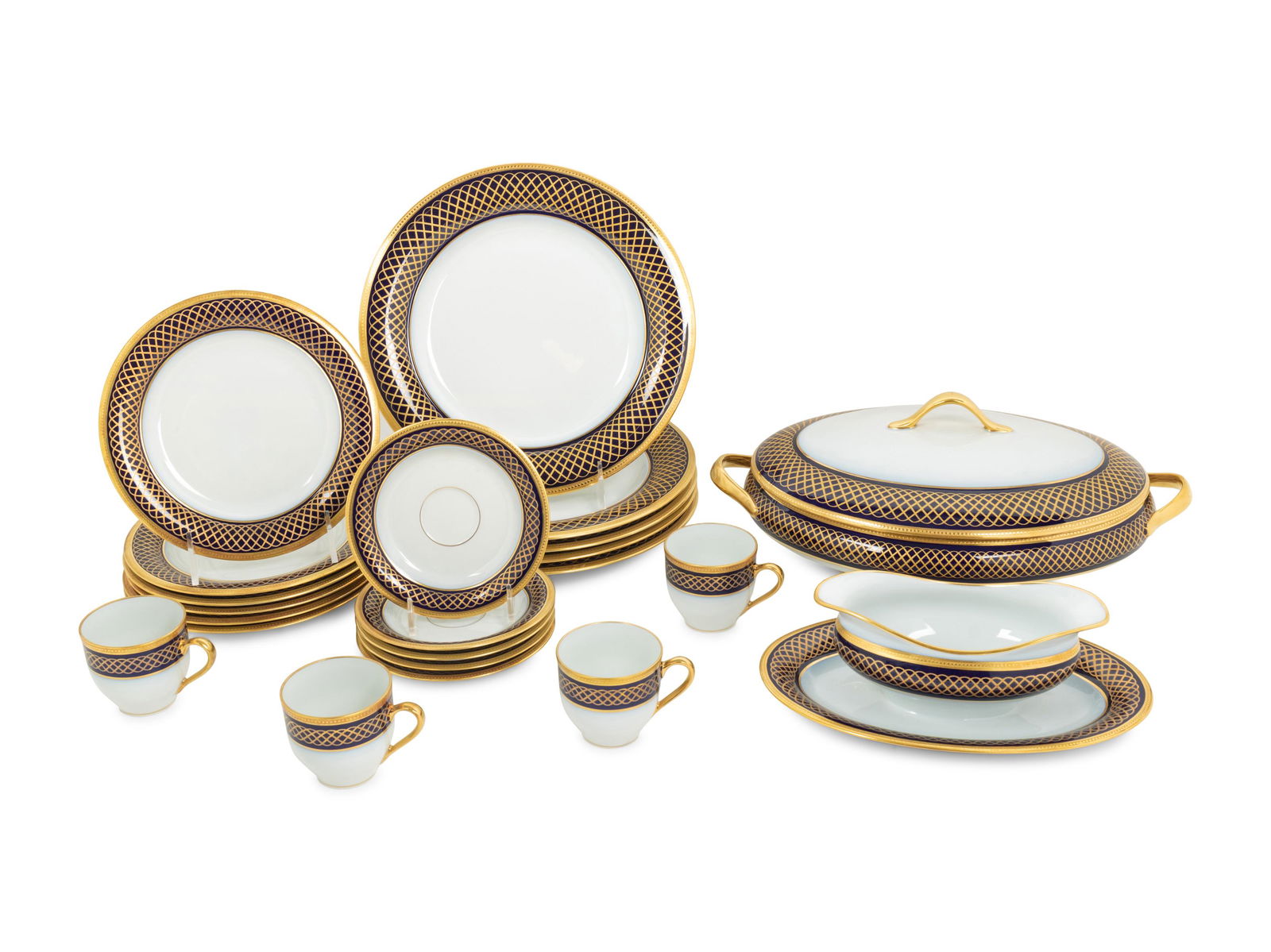 A Bernardaud Limoges Porcelain Dinner Service: A Bernardaud Limoges Porcelain Dinner Service 20th Century comprising: 24 dinner plates 12 salad plates 12 soup bowls 12 bread plates 11 teacups 12 saucers 1 oval dish 1 sauce bowl with attached under