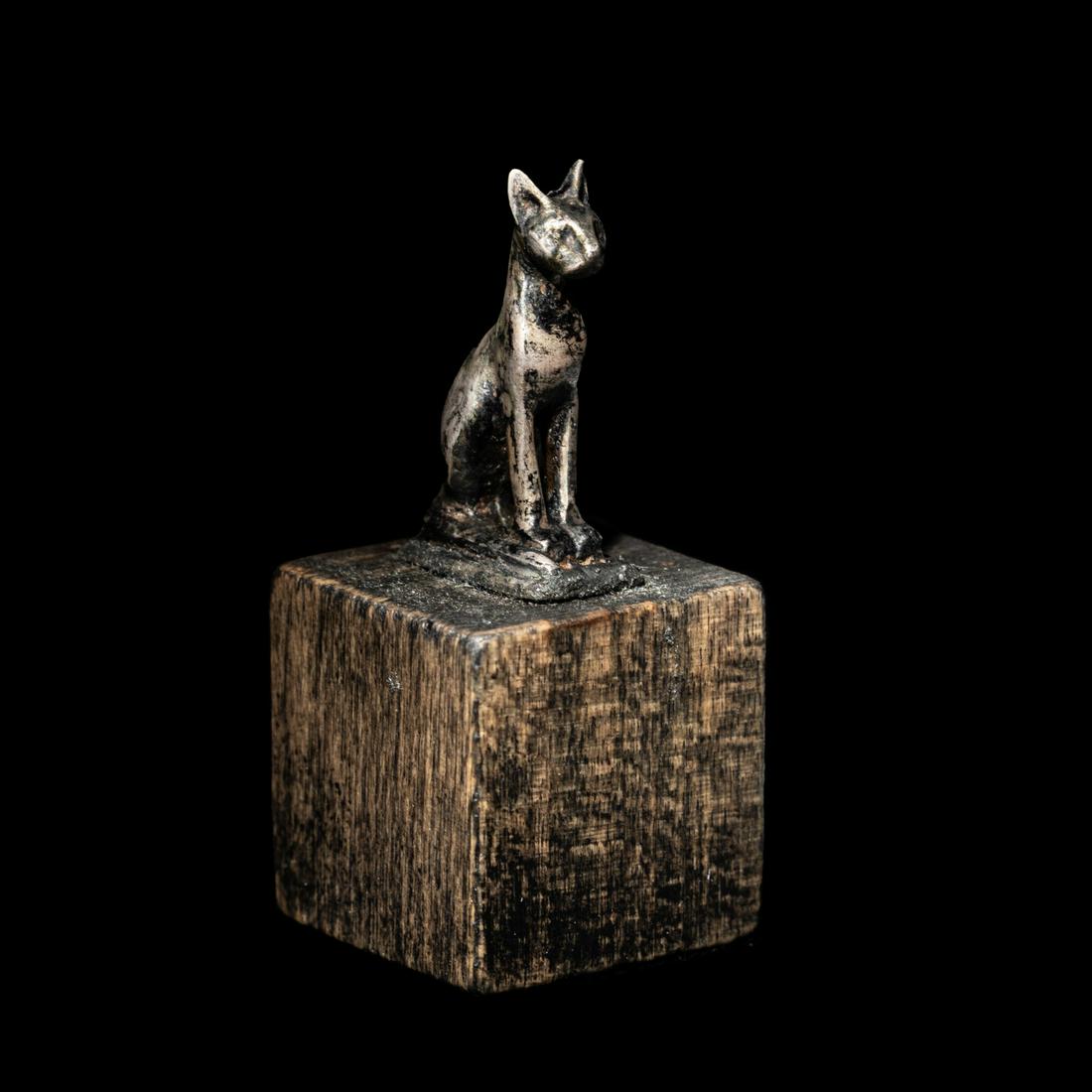 An Egyptian Silver Cat Height 1 1/2 inches (3 cm). (1 of 3)