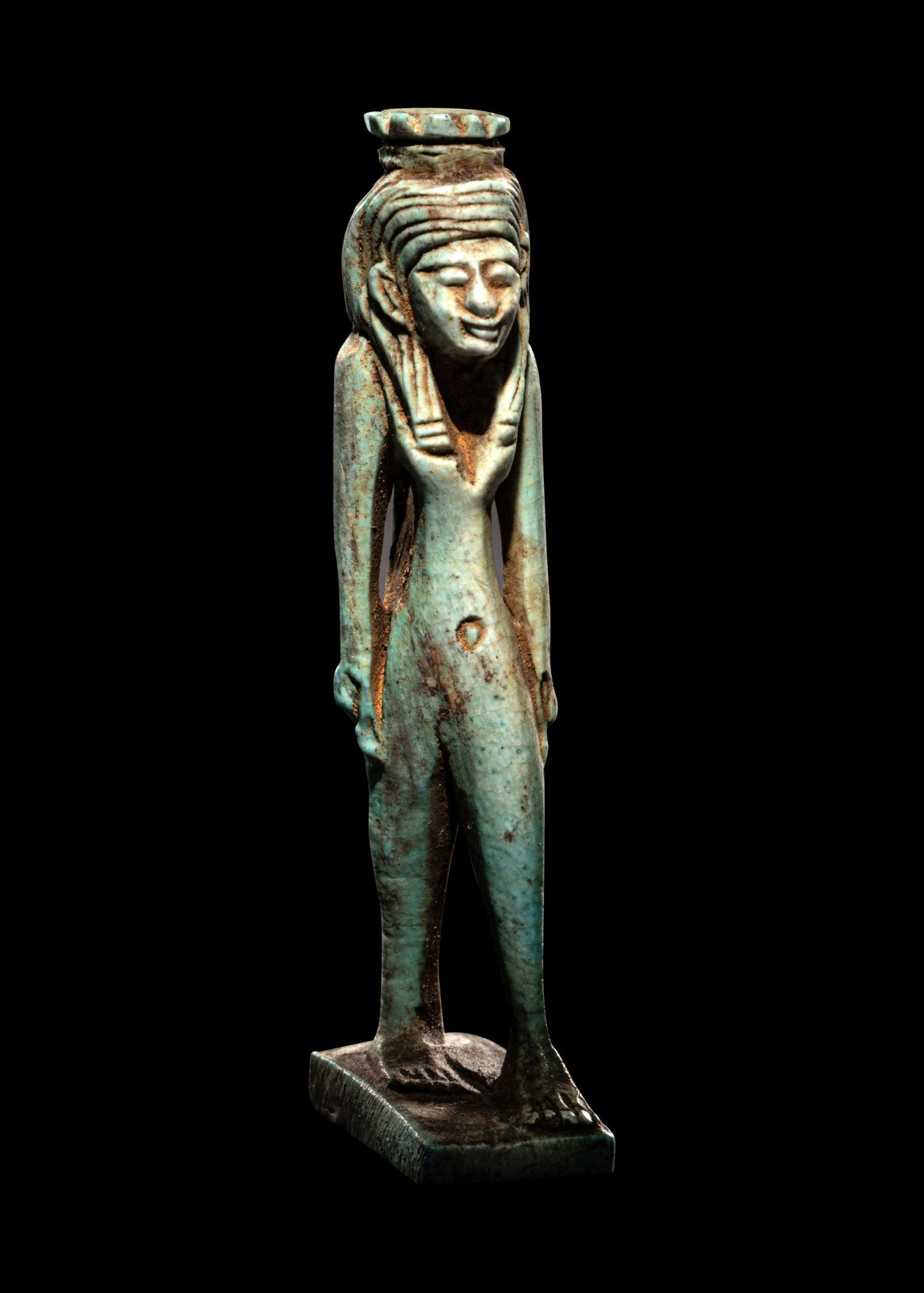 An Egyptian Faience Isis Height 2 1/3 inches (5 cm). (1 of 4)