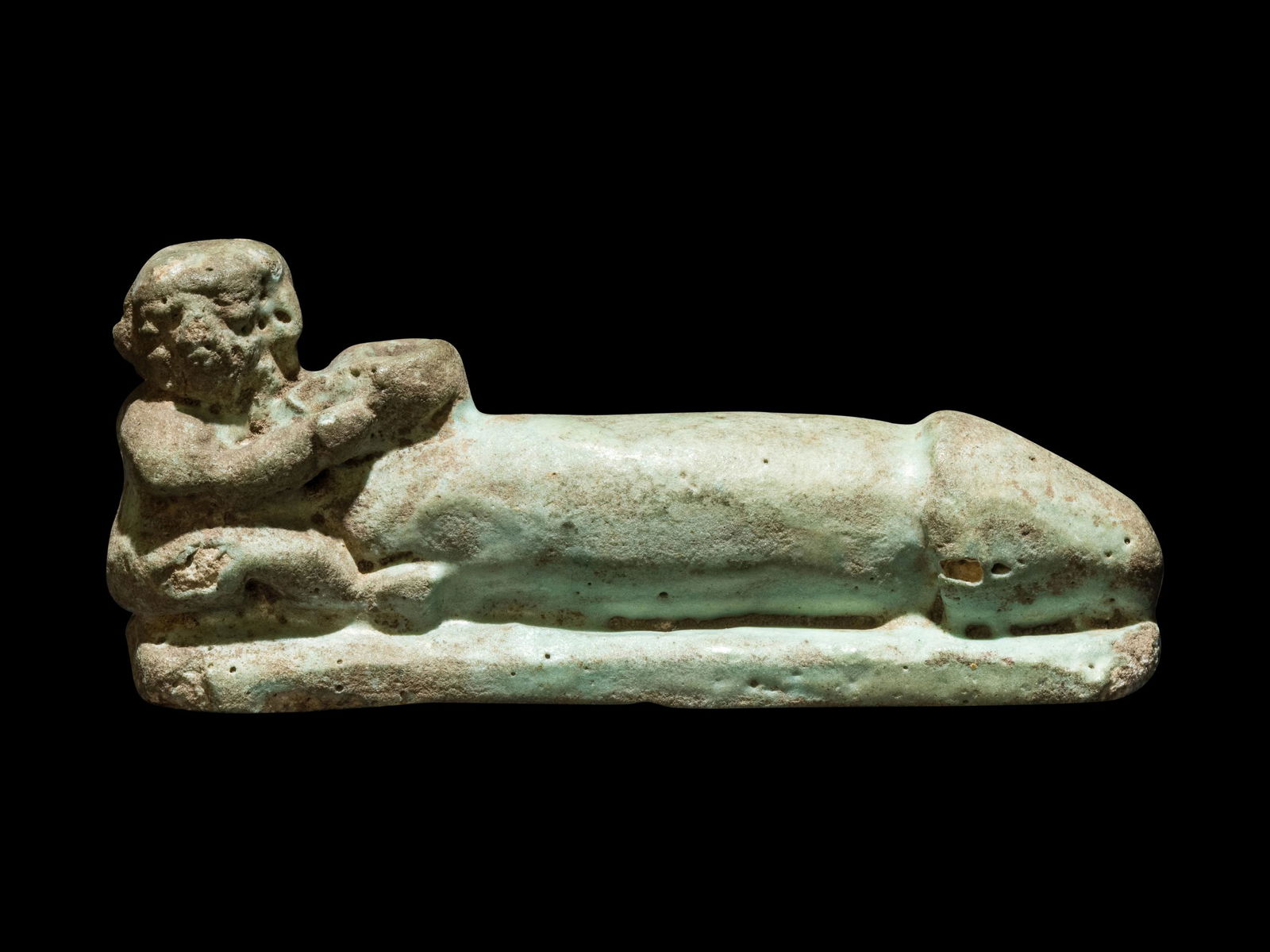 An Egyptian Faience Eroticon Length 2 3/4 inches (7: An Egyptian Faience Eroticon Late Period to Ptolemaic Period, 664-30 B.C. Length 2 3/4 inches (7 cm). Property from a New York Private Collection Provenance: Samuel-Jean Pozzi (1846-1918), France. Hot