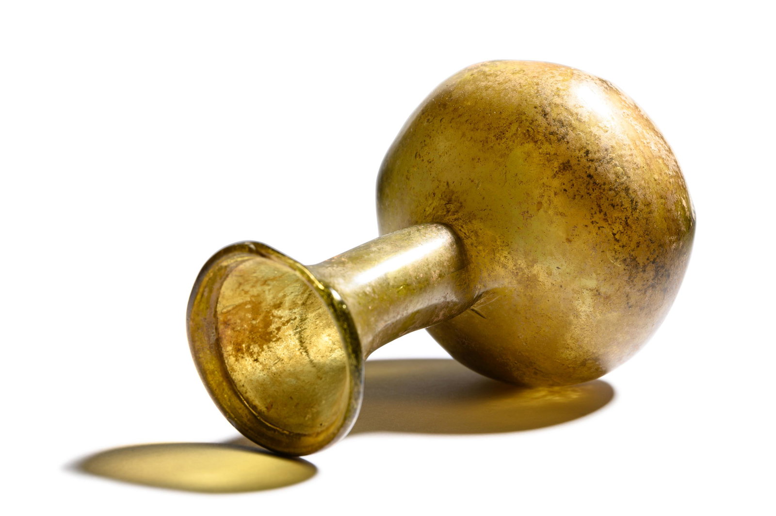 A Roman Glass Bottle Height 5 inches (12 cm).: A Roman Glass Bottle Circa 1st-3rd Century A.D. Height 5 inches (12 cm). Property from the Estate of Charles and Lorraine Janda, Hinsdale, Illinois Provenance: Acquired from Galerie Kevorkian, Paris,