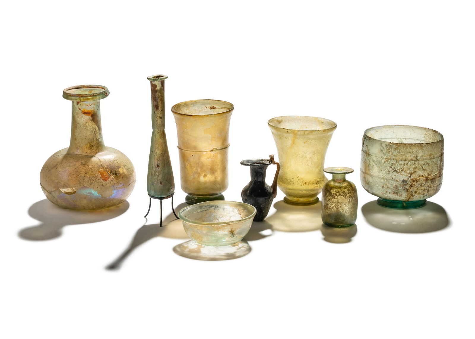Eight Roman Glass Vessels Tallest: 5 inches (12 cm). (1 of 7)