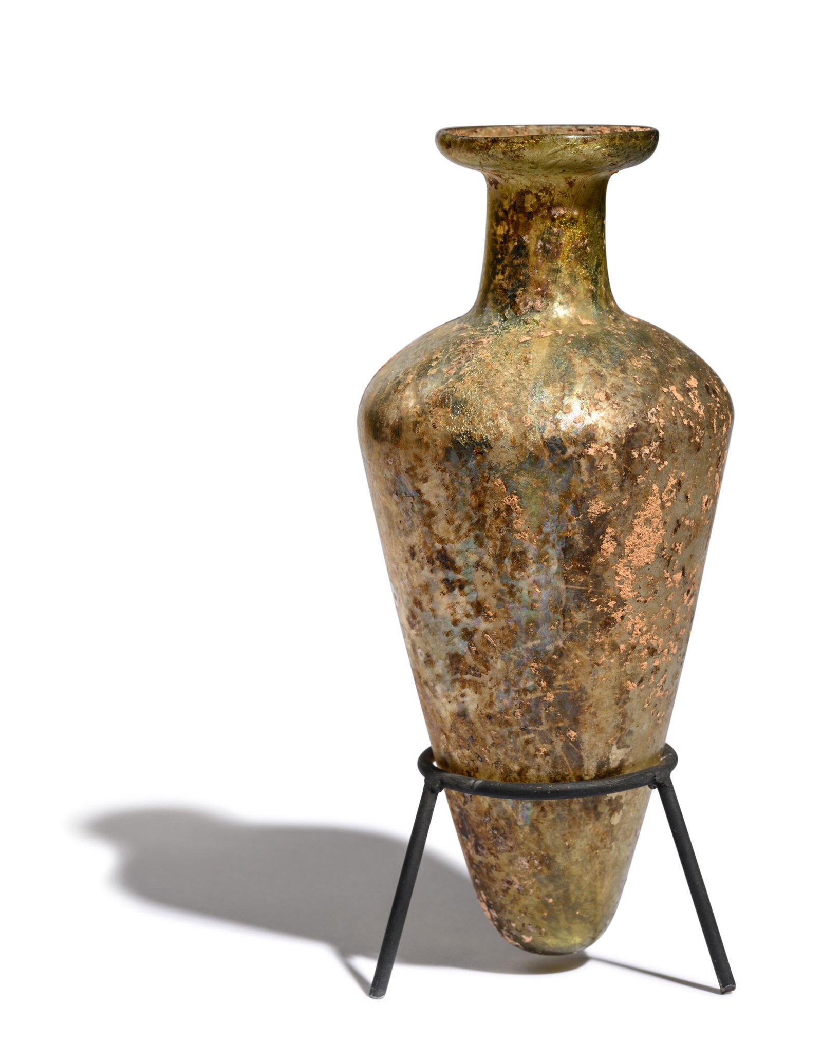 A Roman Glass Unguentarium Height 7 1/4 inches (18 cm).: A Roman Glass Unguentarium Circa 1st Century A.D. Height 7 1/4 inches (18 cm). Property from the Estate of Mr. Curt and Dr. Fleur Strand of New York City, New York and Snowmass Village, Colorado Prove