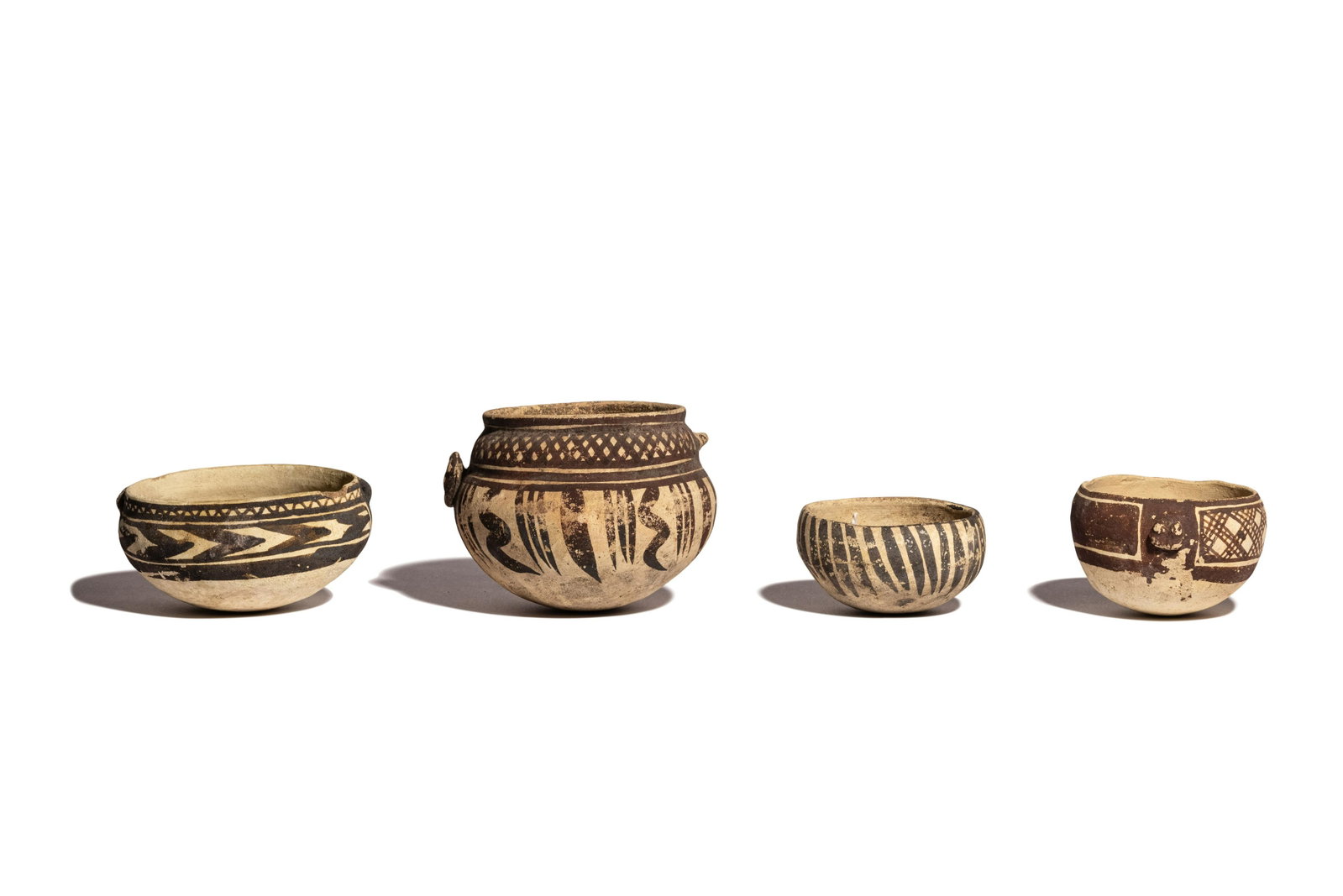 Four Chancay Polychrome Vessels Tallest: 4 inches (10: Four Chancay Polychrome Vessels Peru, Circa 12th-14th Century A.D. Tallest: 4 inches (10 cm). Property from a California Private Collection Provenance: Dr. Arthur Sackler, New York. Millea Bros, Ltd.,