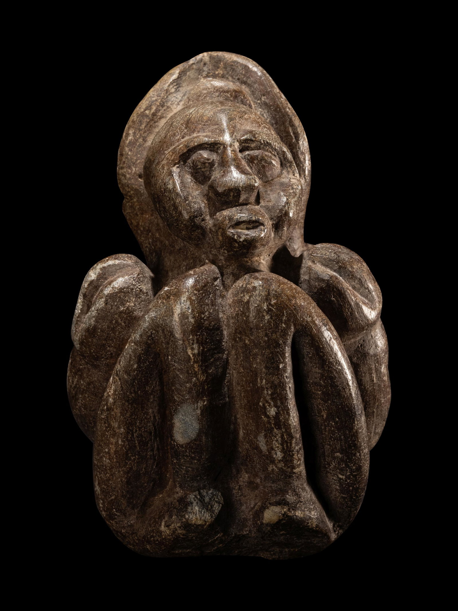 A Kisii Soapstone Sculpture Height 6 inches (15 cm).: A Kisii Soapstone Sculpture Kenya, Circa 20th Century A.D. Height 6 inches (15 cm). Property from the Museum of Fine Arts, St. Petersburg, Florida