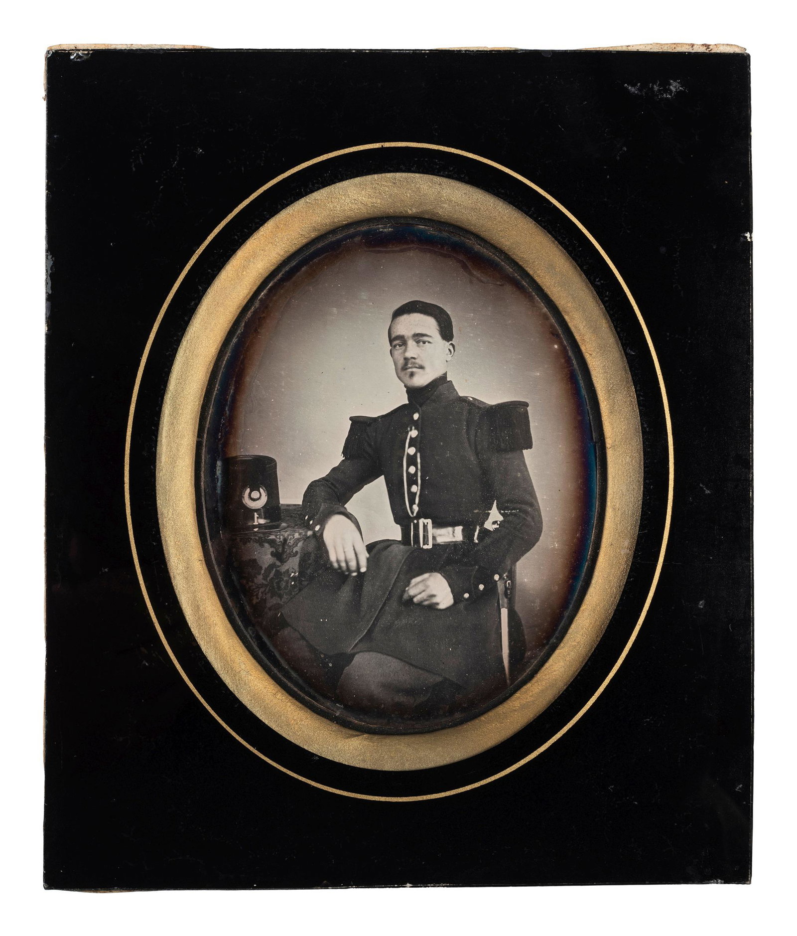 [EARLY PHOTOGRAPHY] -- [MILITARIA]. Half plate: [EARLY PHOTOGRAPHY] -- [MILITARIA]. Half plate daguerreotype of French infantry officer. Ca 1850s. Half plate daguerreotype. (Tarnishing to perimeter.) Housed in black and gilt frame with glass (resea