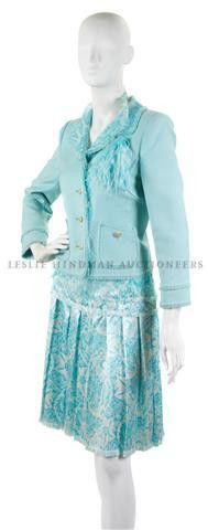 An Oscar de la Renta Light Blue Skirt Suit, Size 8: An Oscar de la Renta Light Blue Skirt Suit, jacket with chiffon trim, blue paisley silk skirt. Labeled: Oscar de la Renta. Size 8. Property of a Lady New York City, New York