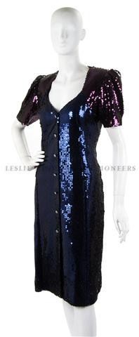 An Ungaro Purple Sequin Dress,: An Ungaro Purple Sequin Dress, with rhinestone buttons. Labeled: Emanuel Ungaro. Property of a Lady New York City, New York