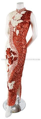 A Gerard Saint-Albin Red and Cream Sequin Evening : A Gerard Saint-Albin Red and Cream Sequin Evening Gown, 1960s, with all-over sequins in a floral motif, Mandarin collar, straight fit. Labeled: Gerard Saint-Albin/Broderies Faites a la Main.