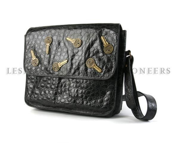 A Group of Three Moschino Bags,: A Group of Three Moschino Bags, together with a matching Moschino top. Stamped: Moschino.