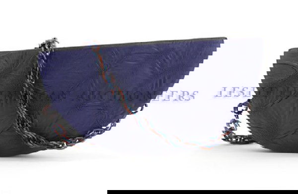 A Missoni Semi-Circular Purple Leather Purse, 8 x: A Missoni Semi-Circular Purple Leather Purse, 1980s, in a textured design, multicolored plastic link shoulder strap, fully lined. Labeled: Missoni. 8 x 15 1/2 inches.