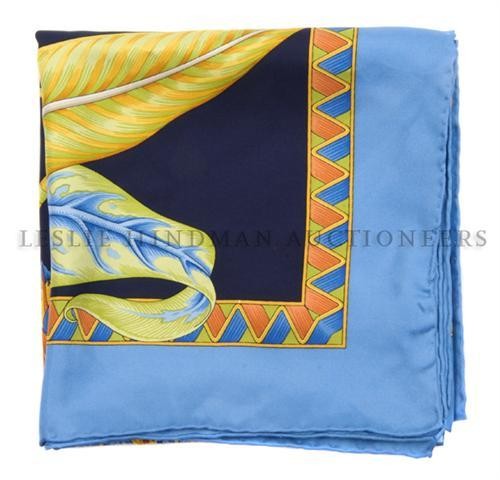 A Ferragamo Silk Scarf, 35 x 35 inches.: A Ferragamo Silk Scarf, in a floral motif. Labeled within print: Ferragamo. 35 x 35 inches.