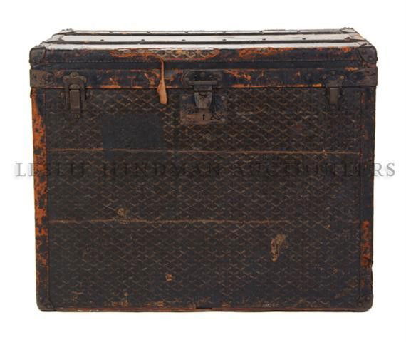 A Goyard Tall Steamer Trunk, 25 x 31 1/2 x 22 1/2: A Goyard Tall Steamer Trunk, early 20th century, with chevron print, stamped K.M.P. 25 x 31 1/2 x 22 1/2 inches. Property from the Collection of Mr. John Mix, Chicago, Illinois