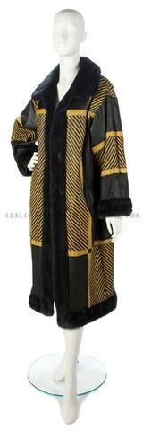 A Tan and Black Tiger Striped Mink Coat,: A Tan and Black Tiger Striped Mink Coat, reversible to black and tiger striped leather. Property from the Estate of Eunice Johnson, Chicago, Illinois