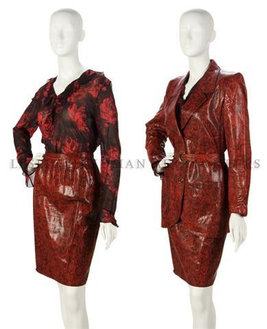 An Ungaro Red Leather Skirt Suit, Size 10.: An Ungaro Red Leather Skirt Suit, embossed to look like snakeskin, together with a silk blouse. Labeled: Emanuel Ungaro. Size 10. Property from the Estate of Eunice Johnson, Chicago, Illinois