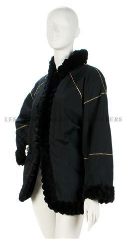 An Yves Saint Laurent Black Fur Trimmed Jacket, Si: An Yves Saint Laurent Black Fur Trimmed Jacket, with a removable fur liner. Labeled: Yves Saint Laurent. Size 42. Property from the Estate of Eunice Johnson, Chicago, Illinois