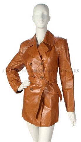 A Roberto Cavalli Caramel Leather Jacket,: A Roberto Cavalli Caramel Leather Jacket, in a trench style, matching belted waist. Labeled: Roberto Cavalli. Property from the Estate of Eunice Johnson, Chicago, Illinois